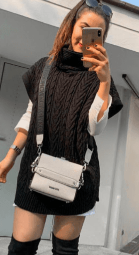 Chaleco largo cuello de tortuga con trenza 2