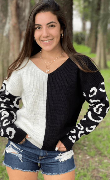 Sueter bicolor cuello amplio detalle jaguar 4