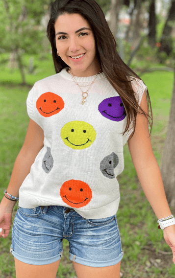 Chaleco caritas colores - Imagen 1